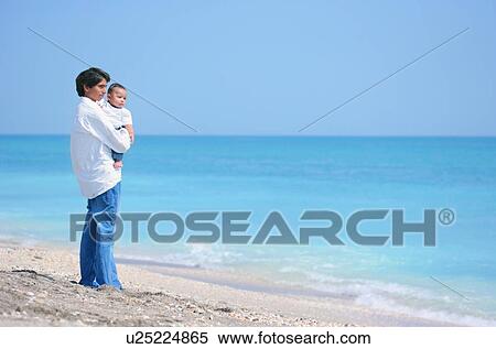 Stock Photography - Father and baby. Fotosearch