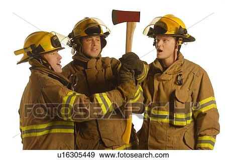 Firefighters holding an ax View Large Photo Image Stock Photo - Firefighters holding an ax. Fotosearch