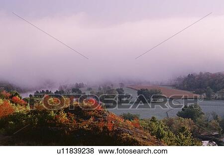 Stock Photo - Foggy landscape. Fotosearch