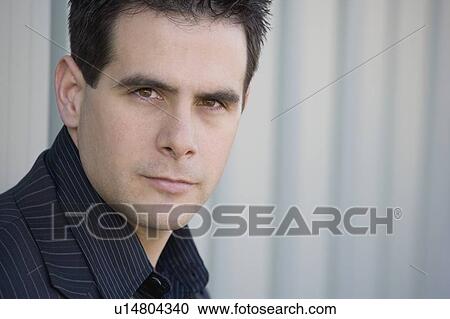 Handsome man in a pinstriped suit View Large Photo Image Stock Image - Handsome man in a pinstriped suit. Fotosearch