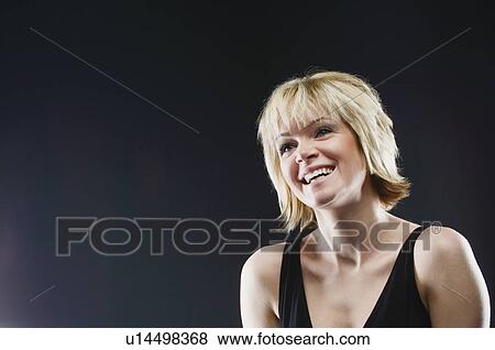 Stock Photo - Head and shoulders of blonde beauty. Fotosearch