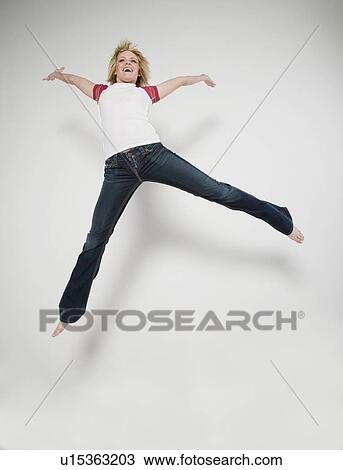 Stock Image - Jump for joy. Fotosearch
