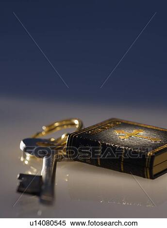 Stock Photography - Key and Bible. Fotosearch
