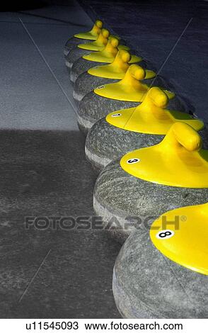 Line of curling rocks View Large Photo Image Stock Image - Line of curling rocks. Fotosearch