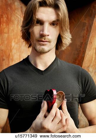 Man Opening his heart View Large Photo Image Stock Photo - Man Opening his heart. Fotosearch