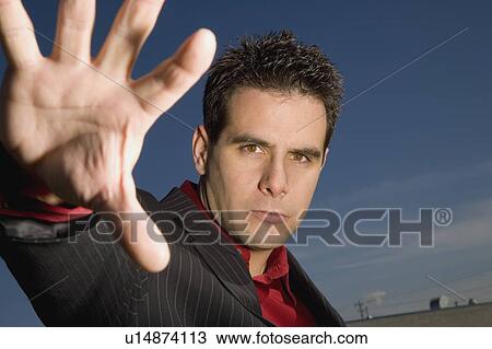 Stock Image - Man with outstretched arm. Fotosearch