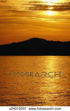 Stock Image - Orange sunset. Fotosearch