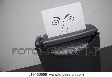 Stock Photo - Paper being shred. Fotosearch