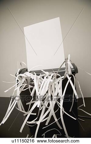 Paper in a shredder View Large Photo Image Stock Photograph - Paper in a shredder. Fotosearch