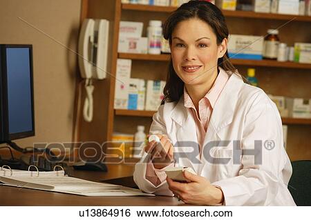 Portrait of a pharmacist View Large Photo Image Stock Photograph - Portrait of a pharmacist. Fotosearch
