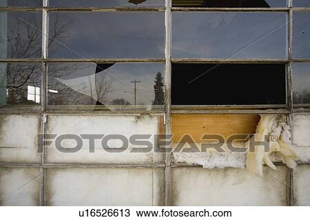 Stock Image - Run-down window. Fotosearch