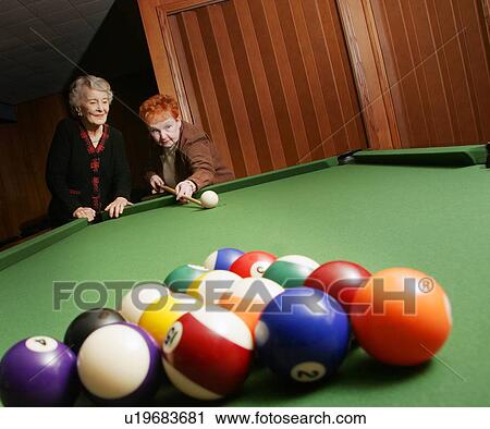 Seniors playing pool View Large Photo Image Stock Image - Seniors playing pool. Fotosearch