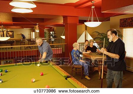Seniors pool night View Large Photo Image Stock Photograph - Seniors pool night. Fotosearch