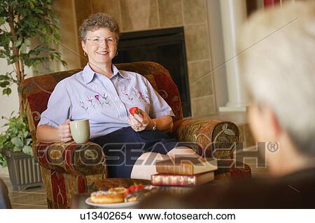 Seniors visiting View Large Photo Image Picture - Seniors visiting. Fotosearch