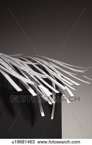 Stock Image - Shredded paper can. Fotosearch