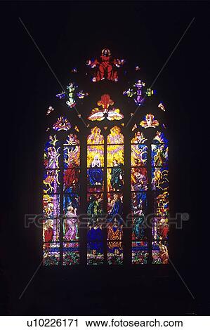 Stock Image - Stained glass window in St. Vitus´ Cathedral, Prague Castle, Prague, Czech Republic. Fotosearch