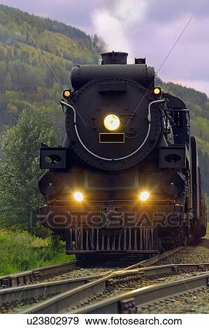 Steam Train on Tracks View Large Photo Image Stock Photo - Steam Train on Tracks. Fotosearch