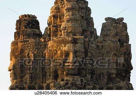 Stone heads on gate, Angkor Thom, Cambodia View Large Photo Image Stock Photograph - Stone heads on gate, Angkor Thom, Cambodia. Fotosearch