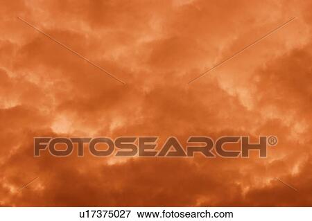 Stock Photo - Sunset clouds. Fotosearch