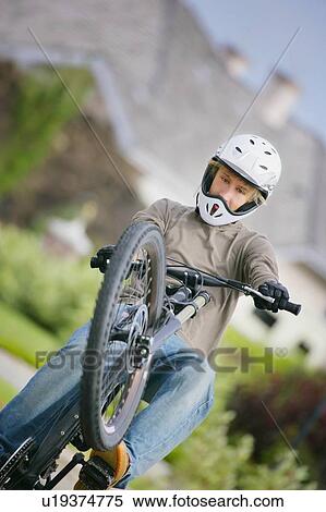 Teen with bicycle View Large Photo Image Stock Photography - Teen with bicycle. Fotosearch