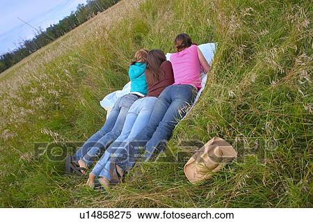 Three teens outdoors View Large Photo Image Stock Photography - Three teens outdoors. Fotosearch