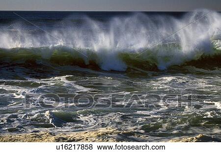 Waves crashing along coast View Large Photo Image Stock Photo - Waves crashing along coast. Fotosearch