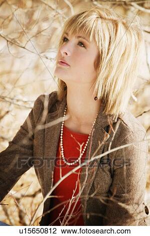 Woman gazing upward View Large Photo Image Stock Image - Woman gazing upward. Fotosearch