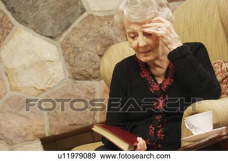 Woman praying View Large Photo Image Stock Photo - Woman praying. Fotosearch