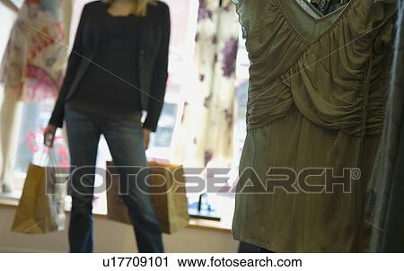 Stock Image - Woman shopping. Fotosearch