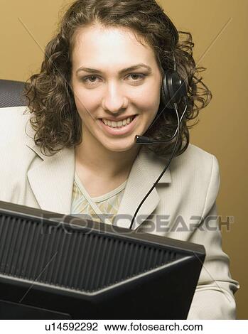 Stock Image - Woman with headphones. Fotosearch