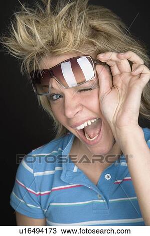 Stock Image - Woman with sunglasses. Fotosearch