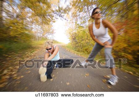 Stock Image - Women stretching for a run. Fotosearch