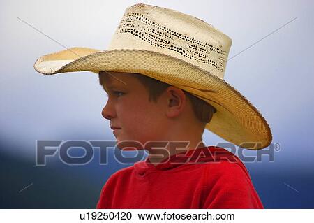 Young boy with cowboy hat View Large Photo Image Stock Image - Young boy with cowboy hat. Fotosearch