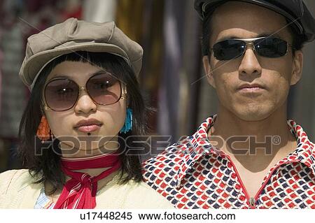 Stock Photography - Young couple with sunglasses. Fotosearch