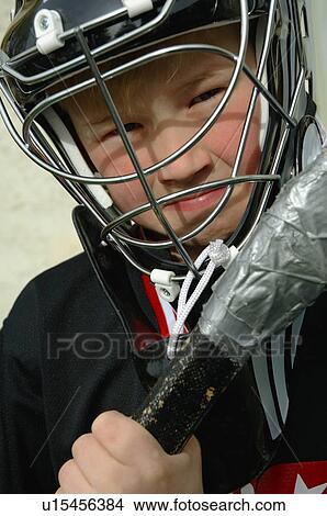 Young hockey player View Large Photo Image Picture - Young hockey player. Fotosearch