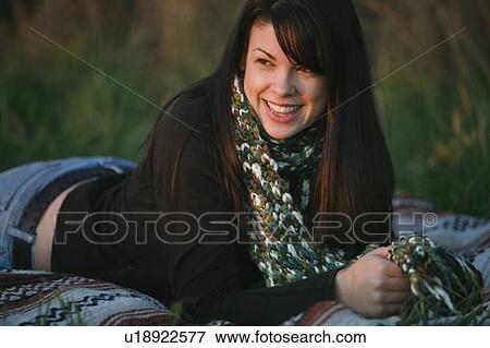Young woman with scarf View Large Photo Image Stock Photo - Young woman with scarf. Fotosearch