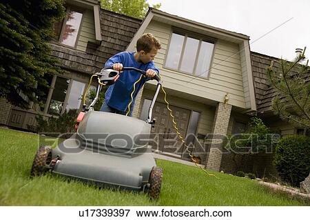 Boy Pushing Lawnmower View Large Photo Image Stock Photo - Boy Pushing Lawnmower. Fotosearch