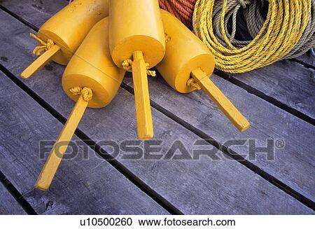 Stock Image - Buoys and ropes. Fotosearch