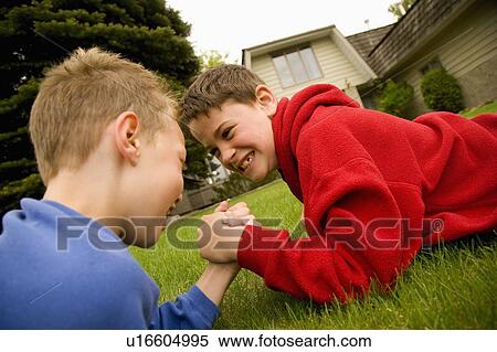 Children arm wrestling View Large Photo Image Stock Photography - Children arm wrestling. Fotosearch