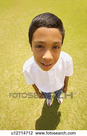 Stock Image - High-angle portrait of a boy. Fotosearch