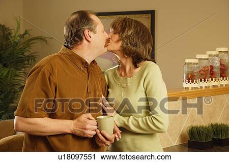 Stock Image - Kissing couple. Fotosearch