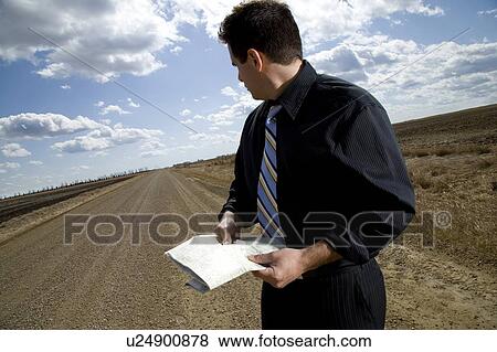 Stock Photo - Lost businessman. Fotosearch