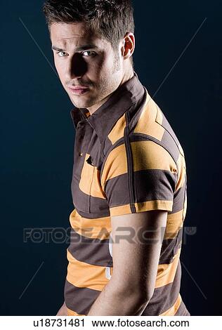 Stock Image - Man in Rugby Shirt. Fotosearch