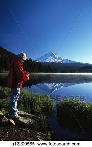 Stock Photography - Mount Hood and man. Fotosearch