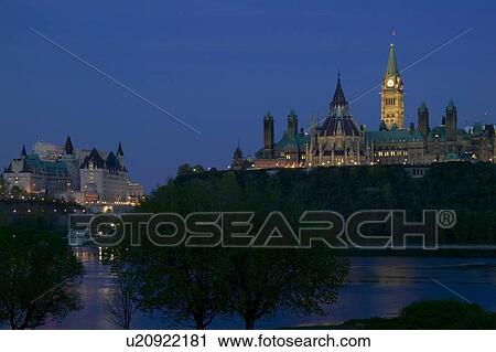 Stock Image - Parliament Hill from Ottawa River. Fotosearch