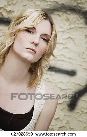 Portrait of a young woman View Large Photo Image Stock Photo - Portrait of a young woman. Fotosearch