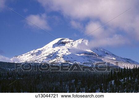 Stock Image - Snowy mountain peak. Fotosearch