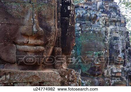 Stone Heads at Bayon Temple View Large Photo Image Stock Image - Stone Heads at Bayon Temple. Fotosearch