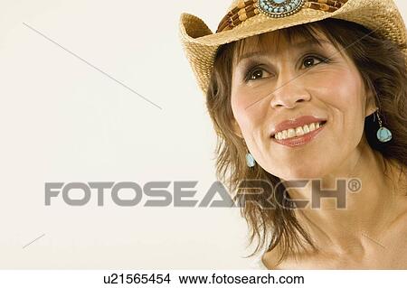 Woman in cowboy hat View Large Photo Image Picture - Woman in cowboy hat. Fotosearch