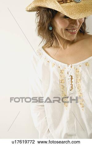 Woman in cowboy hat View Large Photo Image Stock Image - Woman in cowboy hat. Fotosearch